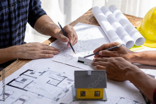Engineer Teamwork Meeting, Architect contractor meetings of real estate brokers and company presidents to select a model to build a housing estate in writing and presenting to state organizations. 