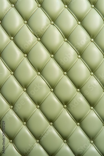 Seamless light pastel olive diamond tufted upholstery background texture © GalleryGlider