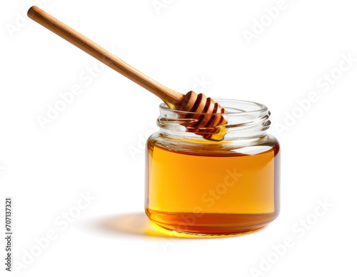 Glass bowl of honey with honey dipper Good for health For making food, medicine, cosmetics.  isolated on white background. 