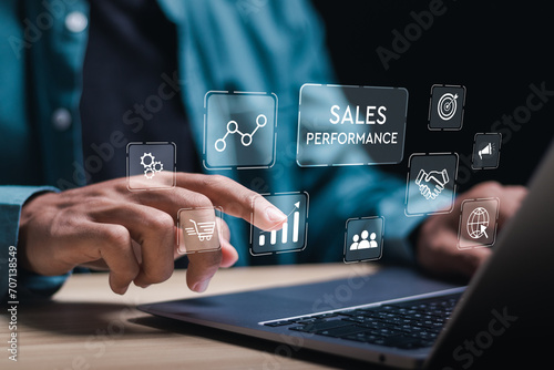 Sales performance management concept. Businessman use laptop to analyze data and sales performance. Strategic Decision Making for Operations Management, increase sales and business growth. photo