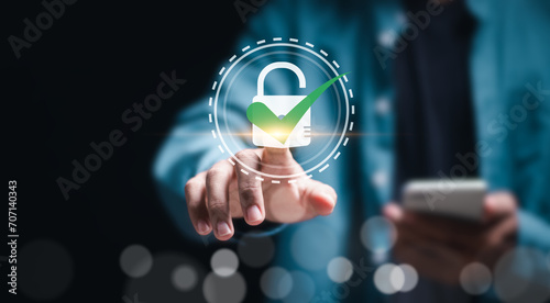 Cybersecurity and privacy concepts to protect data. Person toch virtual padlock icon to unlock. Protecting personal data and secure internet access.
