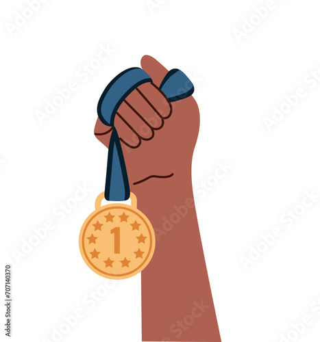 Hand holding gold medal. Symbol of relay race, competition victory, champion or winner.