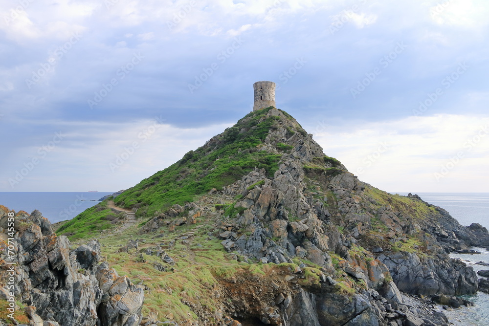 Aerial view of the remains of the Genoese Tower of La Parata built on an overlook at the end of a cape near Ajaccio in Corsica, France