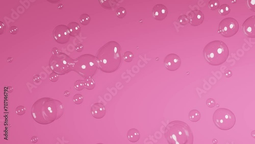 Transparent bubbles flow on magenta pink background. Abstract concept background, macro view, cosmetics intro, advertising backdrop. Sinking bubbles. liguid motion