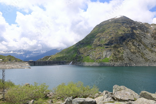 a scenic view of the lake Montespluga in Valley Chiavenna, Lombardy, Italy photo