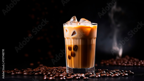 cold coffee with ice on a black background