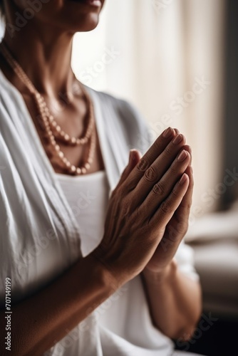 cropped shot of an unrecognizable woman doing a mindfulness exercise at home
