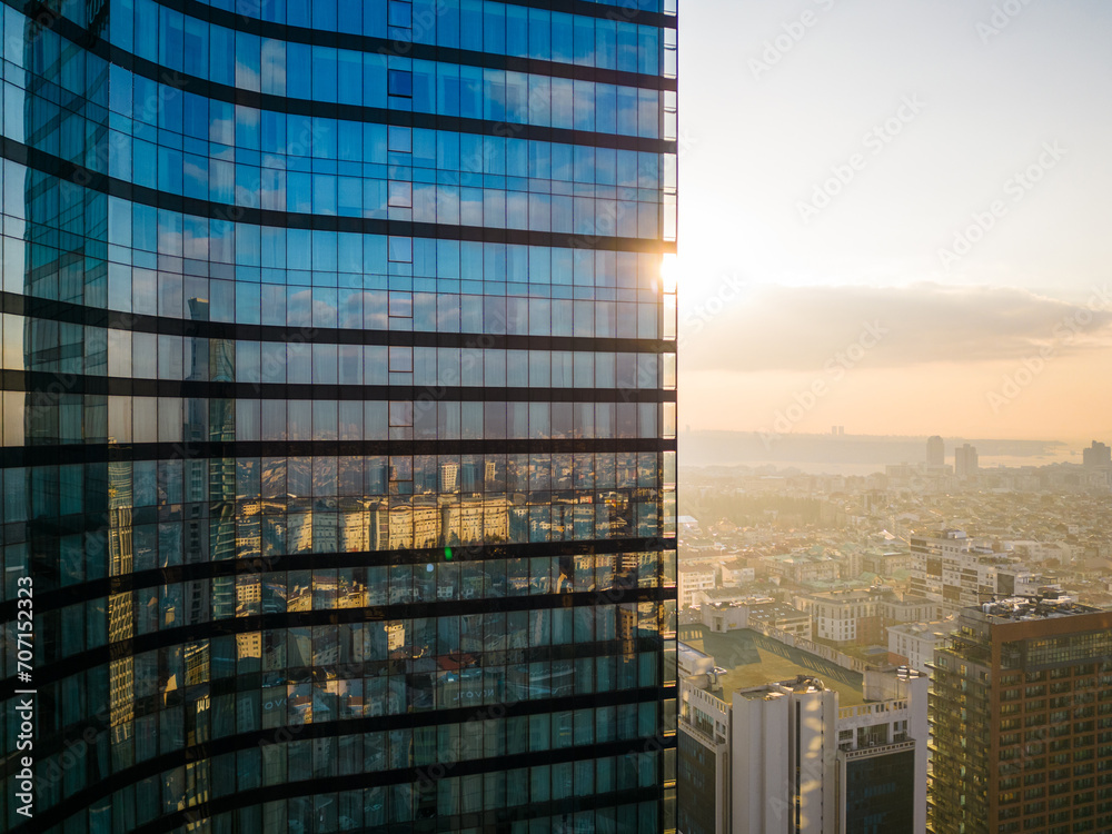 Fototapeta premium Istanbul's glass and concrete skyscrapers, home to offices, hotels, and residential complexes. Aerial drone view