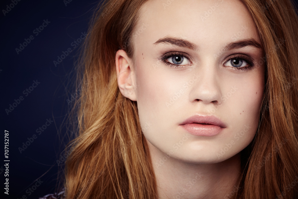 Fototapeta premium Woman, cosmetics and hair in studio portrait, keratin treatment and pride for results by black background. Female model person, beauty and aesthetic makeup, face and hairstyle care or confidence