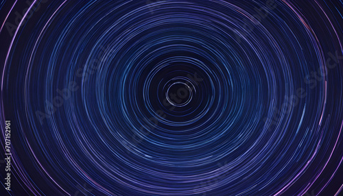 the blue background is hypnotic or cosmic - circular lines twist and move away from the center of the picture