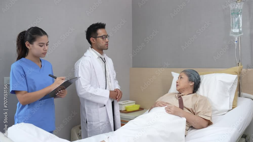 Staff and physical therapists check and help rehabilitate an Asian female patient. Staff and physical therapists check and help rehabilitate an Asian female patient.