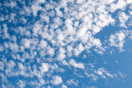 Background from blue sky with white clouds for publication, poster, calendar, post, screensaver, wallpaper, postcard, banner, cover. High quality photo © vveronka