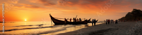 Fishermen boats piled up on the sand of the beach at sundown © PaulShlykov
