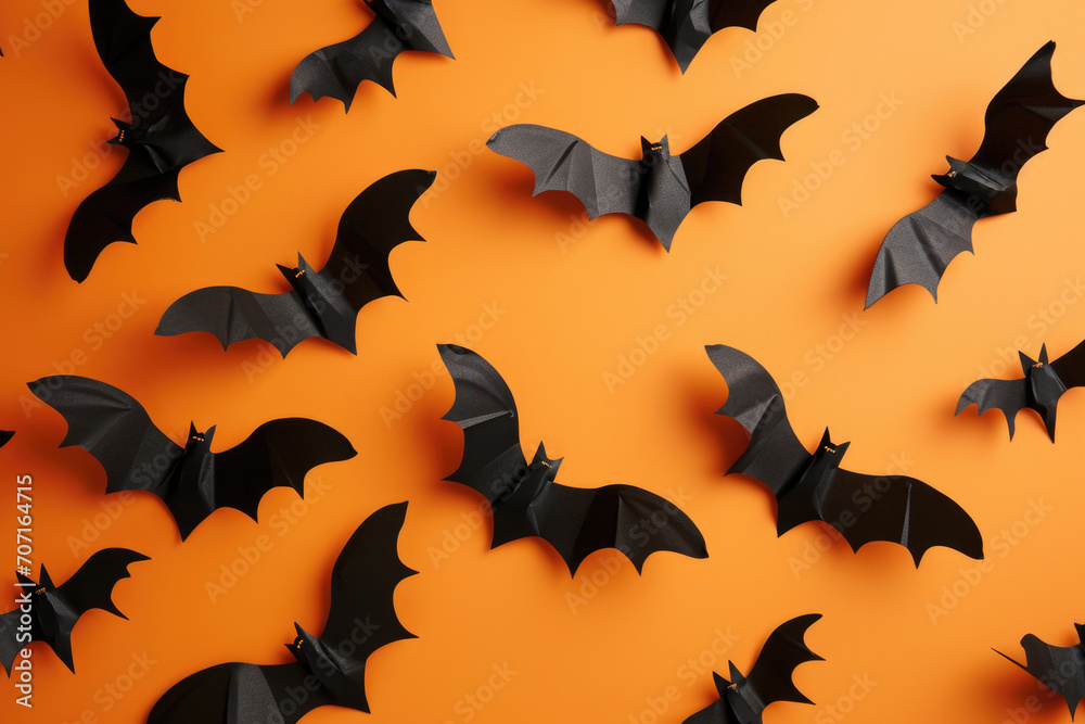 Halloween Diy: Creating Spooky Bat Decorations On An Orange Background