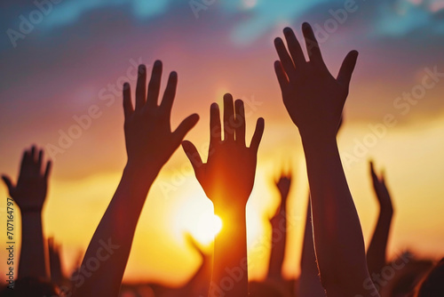 Capturing The Beauty Of Christian Worship And Praise As Hands Rise Against The Sunset