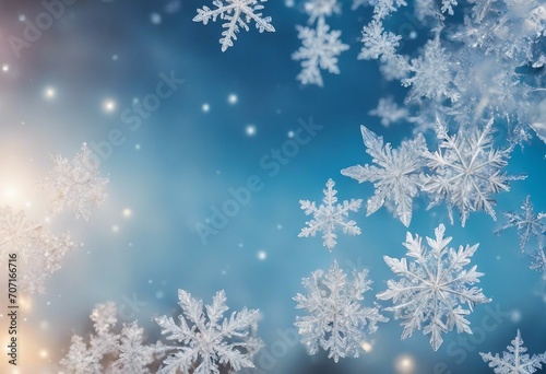 Snowflakes and ice crystals isolated on blue sky winter background panorama banner long © ArtisticLens