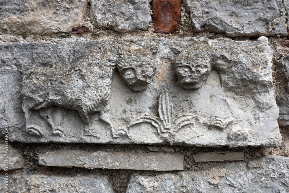 Ancient Stone Carving Ornaments and Symbols on a Town Streets Walls - Osor, Croatia