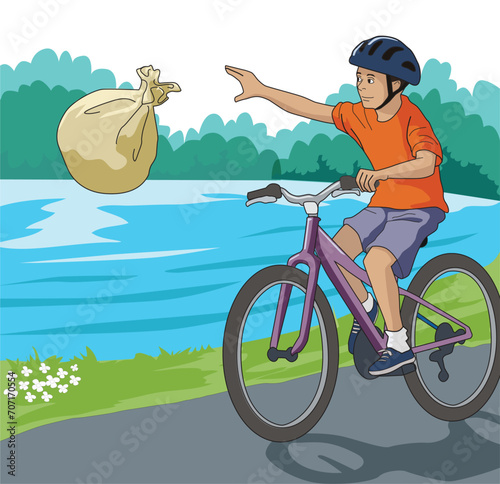 Young boy throwing garbage sack in the river