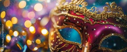 Mardi Gras gold and red carnival mask with decorations © Ringo