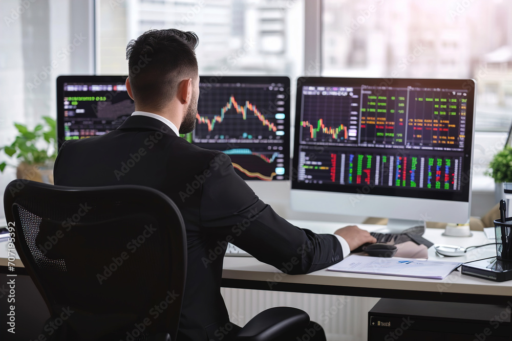 A financial analyst studying cryptocurrency market trends on a computer. Cryptocurrency market graphics on monitor. A financial analyst studying cryptocurrency market trends on a computer. Cryptocurrency market graphics on monitor.