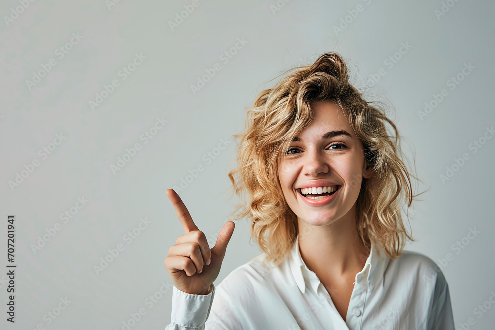 Amazing lady indicating finger on empty discount banner. People, advertisement concept. Amazing lady indicating finger on empty discount banner. People, advertisement concept.