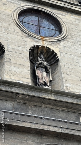 statue of a person in a church