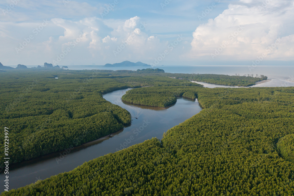 Aerial top view of Heart island in Trang province, Thailand. Forest trees in nature landscape background.