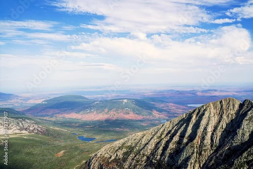 Panoramic Sunny Day Timelapse of Cloud Movements Over Mount Katahdin, Maine: Blue Sky and Mountain Scenery photo
