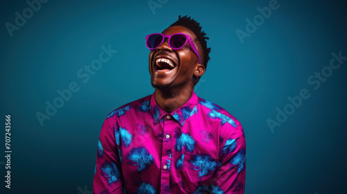 Man in vibrant indigo vivid magenta setting joyful laughter