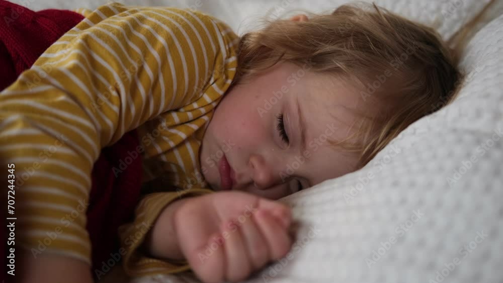 Child Falls Asleep. Peaceful Adorable Baby Sleeping at Home. Slumbering Little Toddler. Two Years Old Girl Sleeps. Nursery Room Interior Background. Serene Dream. Cute Face Close Up. Deep Kid Slumber	