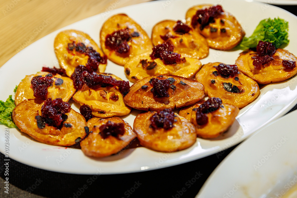 Polish oscypek cheese with sweet jam.