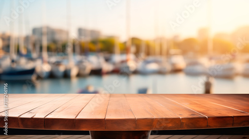 Empty wooden table in front blur yacht club background, product display photo
