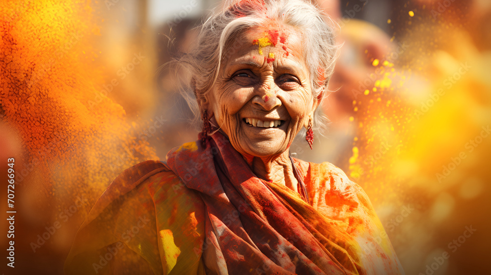 Radiant elderly woman covered in Holi colors, her laughter echoing the festival's vibrant joy.