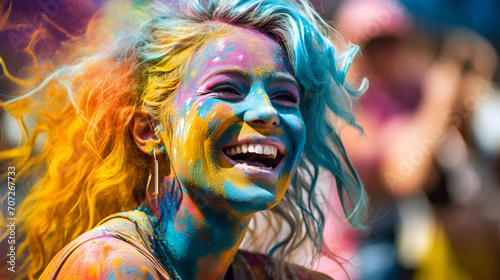 Woman's face artfully painted in celebration of Holi's vibrancy. This image is excellent for promoting cultural festivals like Holi, in travel and cultural publications