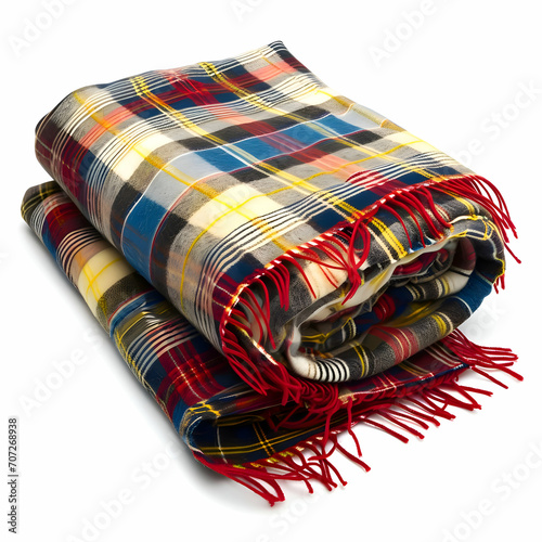 Folded plaid checked blanket isolated on a white background. High quality