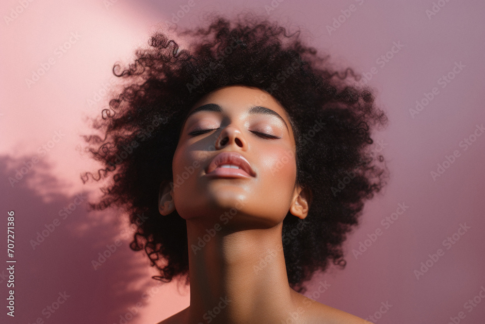 Beautiful african american woman with closed eyes on pink background Beautiful african american woman with closed eyes on pink background