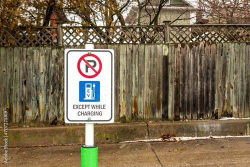 Canvas Print green infrastructure: ev  charging station signage no parking except while charg