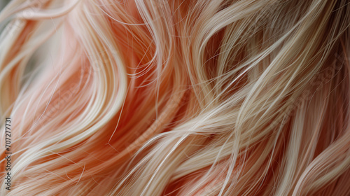 A close up of a woman long blonde hair in peach fuzz color. color of the year 2024 . 