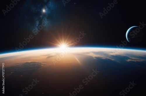 The edge of planet Earth on the background of space in the rising rays of the sun