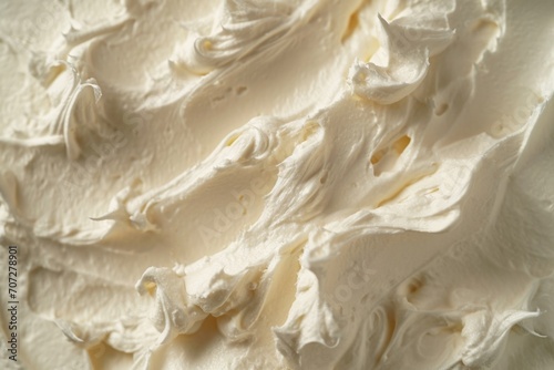 A close up shot of whipped cream on a plate. Perfect for adding a touch of sweetness to any dessert