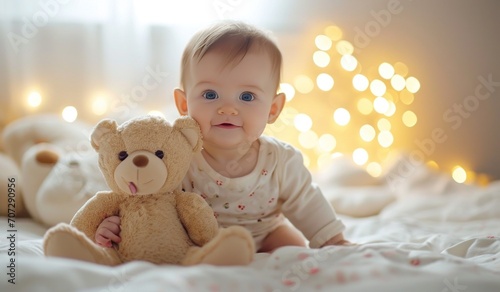 a baby dressed in a hood with a bear.