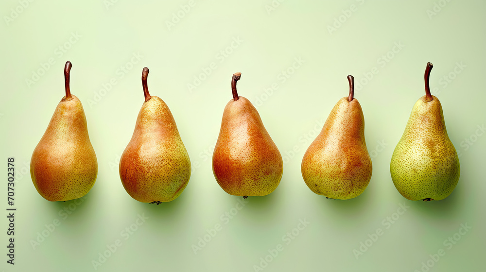 banner with a series of ripe pears in a row, with a light green background, each pear standing upright. banner with a series of ripe pears in a row, with a light green background, each pear standing upright.