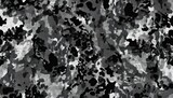 seamless rough textured military hunting or paintball camouflage pattern in a dark black and grey night palette tileable abstract contemporary classic camo fashion textile surface design texture