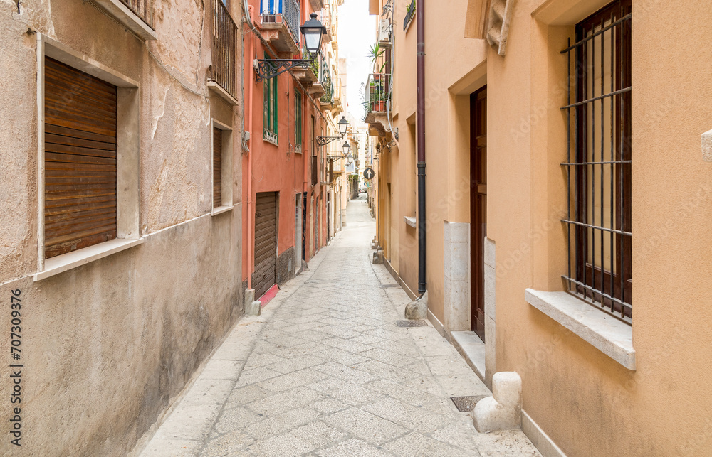 Narrow street in the historic center of Trapani, Sicily, Italy