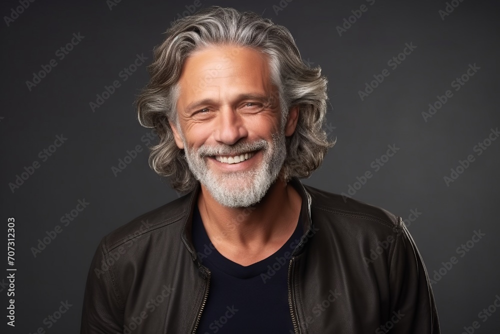 Portrait of a happy senior man with gray hair and beard. - obrazy, fototapety, plakaty 