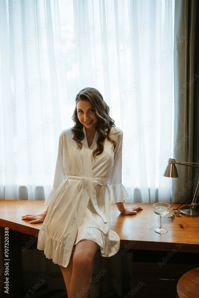 the bride gets ready in the morning in her room the bride gets ready in the morning in her room