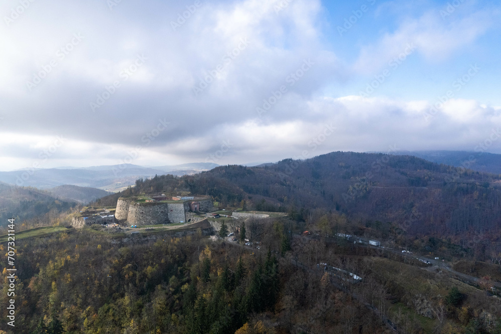 Southern Poland landscape, mountains, autumn, day, sun, sky, clouds, Klodzka Basin, dramatic and majestic scenery Southern Poland landscape, mountains, autumn, day, sun, sky, clouds, Klodzka Basin, dramatic and majestic scenery