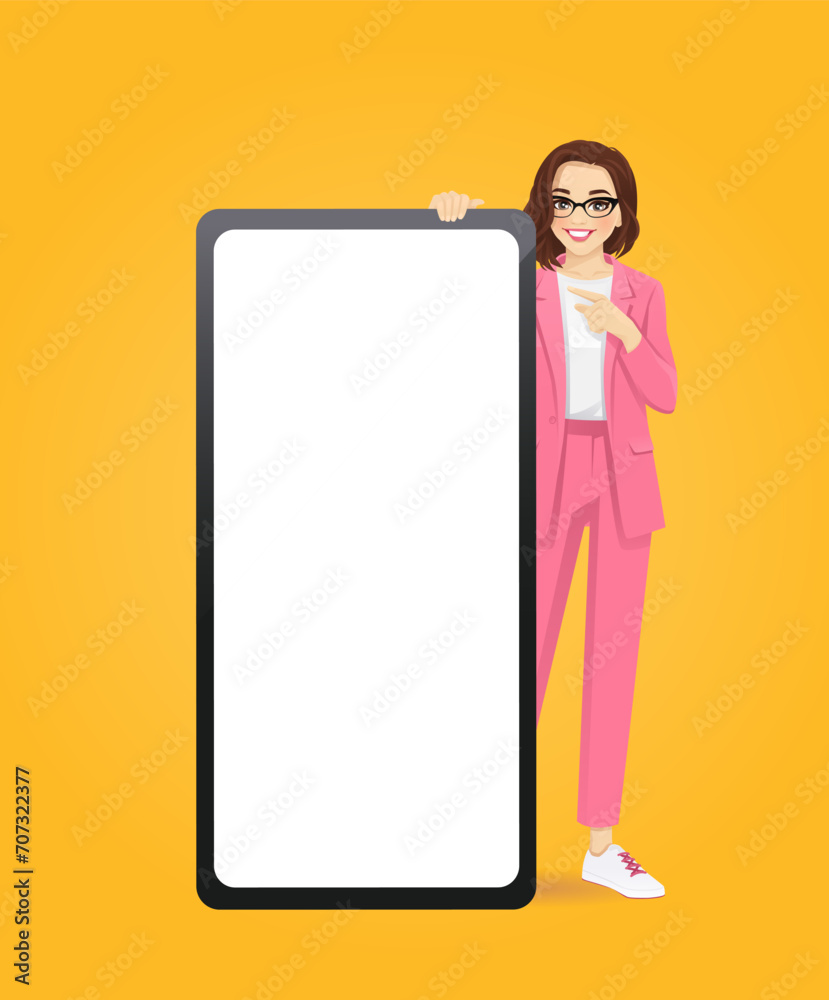 Elegant business beautiful woman standing behind huge blank phone and pointing to screen vector illustration on yellow background Elegant business beautiful woman standing behind huge blank phone and pointing to screen vector illustration on yellow background