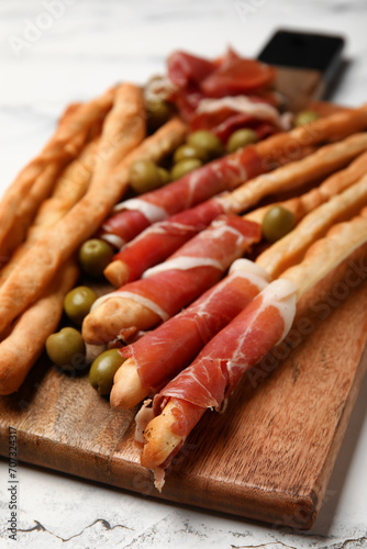 Breadsticks wrapped with cu...