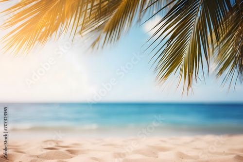Tropical beach with palm leaves. Vacation and travel concept © Yuliia